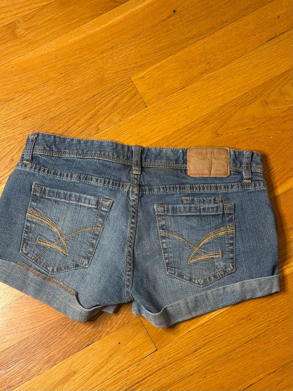 Rare vintage Y2K Amethyst Jeans ultra-low-rise denim shorts in a medium-wash blu